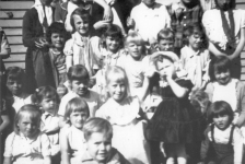 547: Madge Barry's birthday party. (circa 1963) [courtesy of Mary (Barry) Bruce] ** also see 546 **  Top row left-to-right, Ethel Lambe (kerchief), Myra Carroll (glasses), Eileen Ryan (with an  arm around her shoulder), unidentified (owner of arm), Gert Ryan (white dress),  Rose Whelan (plaid dress), unidentified, Marion Counsel (wearing tie); 2nd to top row,  Marilyn Rose (bangs, striped dress), Patricia Ryan (tall), Mercedes Ryan, Anne Marie Ryan  (blonde), ? Ryan, Linda Whelan; 3rd to top row, ? Ryan (with bangs),  ? Ryan (cheeks puffed up), Christina Ryan, Sheila Ennis (blonde), Madge Barry (white bonnet  and black dress), unidentified (boy's face), Anita Counsel (bib front); bottom row,  Ursula Ryan, Margie Ryan, Anthony Ryan (front), Joanie Ryan (with suspenders).  - Madge Barry (of Denis Patrick Barry &amp;amp; Kathleen Hayes)  - Myra Carroll (of Michael Carroll &amp;amp; Josephine Barry)  - Anita Counsel (of Michael Counsel &amp;amp; Mary Anne Barry)  - Marion Counsel (of Michael Counsel &amp;amp; Mary Anne Barry)  - Sheila Ennis (of Vince Ennis &amp;amp; Mary Carroll)  - Ethel Lambe (of James Lambe &amp;amp; Catherine Rodgers)  - Marilyn Rose (of Raymond J Rose &amp;amp; Norah Mullins)  - Anne Marie Ryan (of Maurice Ryan &amp;amp; Norah McCarthy)  - Anthony Ryan (of John Ryan &amp;amp; Joan Barry)  - Christina Ryan (of John Ryan &amp;amp; Joan Barry)  - Eileen Ryan (of Albert Ryan &amp;amp; Catherine Nolan)  - Gert Ryan (of John Ryan &amp;amp; Joan Barry)  - Joanie Ryan (of John Ryan &amp;amp; Joan Barry)  - Margie Ryan (of Maurice Ryan &amp;amp; Norah McCarthy)  - Mercedes Ryan (of John Ryan &amp;amp; Joan Barry)  - Patricia Ryan (of Maurice Ryan &amp;amp; Norah McCarthy)  - Ursula Ryan (of Maurice Ryan &amp;amp; Norah McCarthy)  - Linda Whelan (of Leo Whelan &amp;amp; Elizabeth Bishop)  - Rose Whelan (of Leo Whelan &amp;amp; Elizabeth Bishop)
